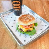 Angus Beef Burgerim · 1/3 lb. patty, house sauce, leaf lettuce, Roma tomato, pickles, shaved onions and American c...