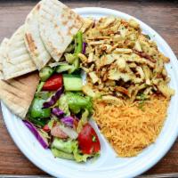 Chicken Shawarma · Served with choice of rice, house salad, garlic sauce and grilled pita.
Add grilled vegetabl...