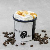 Iced Caramel Macchiato · Espresso, vanilla and caramel sauce.