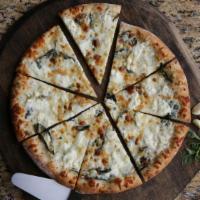 Four Cheese White Pizza · Olive Oil Garlic Basil base with Mozzarella, Parmesan, Feta and Ricotta 