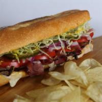 Pastrami Sandwich · Lean pastrami, lettuce, tomatoes, onions, and mustard with provolone served HOT on a baguette.
