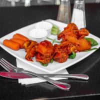 Chicken Wings · Bone in Fried Chicken Wings / Carrots and Celery 