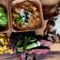 Carne Asada · Beer marinated skirt steak 8 oz. , grilled green onions, guacamole salsa, black beans, queso...