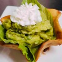 Guacamole Dip · Fried flour tortilla or cheese dip bowl filled with fresh guacamole. Served with chips.