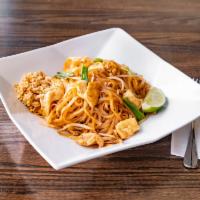 Pad Thai · Traditional Thai style fried noodles with eggs, bean sprouts, green onions, topped ground pe...