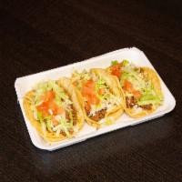 Beef Taco · Shredded cheese, lettuce, diced tomatoes fresh green taco sauce.