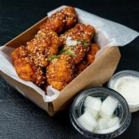 Boneless Wings · Crispy breaded boneless bites. Served with your favorite flavor and optional extras.