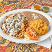 Bistec a la Mexicana Platter · Includes rice, beans, and tortillas.