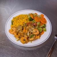 Grilled Shrimp Meal · Fresh shrimp seasoned and grilled to perfection with fresh bell peppers and onions  Served w...