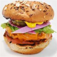 Merican Burger · Vegan hamburger bun, beyond meat patty, vegan American cheese, pickles, lettuce, ketchup, an...