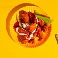Buffalo Wings · Bone in chicken wings with your choice of sauce and dressing.