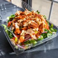 Chicken Gyro Salad · Romaine lettuce, tomato, cucumber, onion, and banana peppers topped with shaved chicken.
