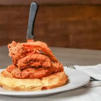 Chicken and Waffle Breakfast  · 4 pieces of fried chicken served with a golden waffle. Includes a side of honey butter and 2...