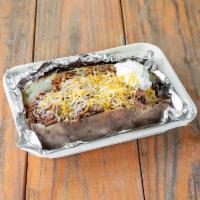 Loaded Baked Potato  · A spud full of butter, chopped brisket or Meyer's sausage, sauce, grated cheese and sour cre...