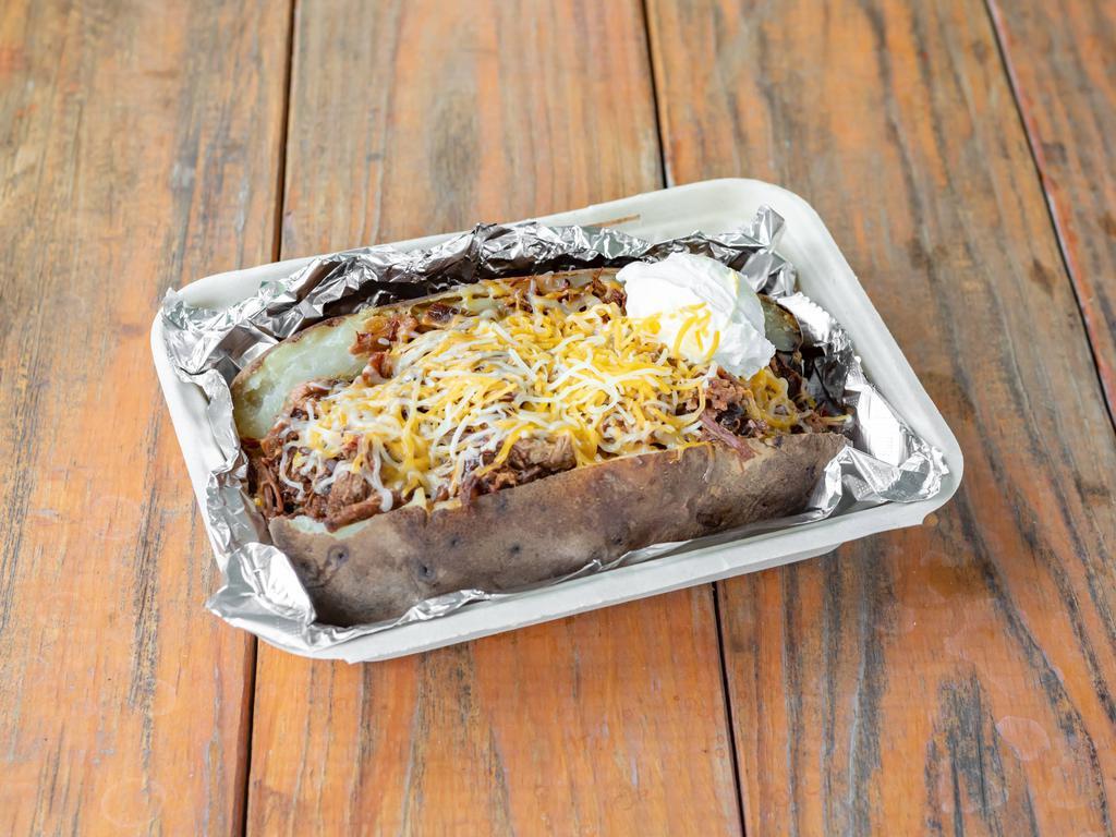 Loaded Baked Potato  · A spud full of butter, chopped brisket or Meyer's sausage, sauce, grated cheese and sour cream. Spudlicious!.
