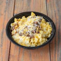 Macalicious  · Cheesy mac-n-cheese topped with chopped brisket, sauce and more cheese! A cheese lover's mus...