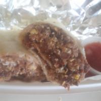 Burrito  Explosion · Fried burrito filled with chopped brisket, bbq sauce, pepper jack cheese and grilled onions....