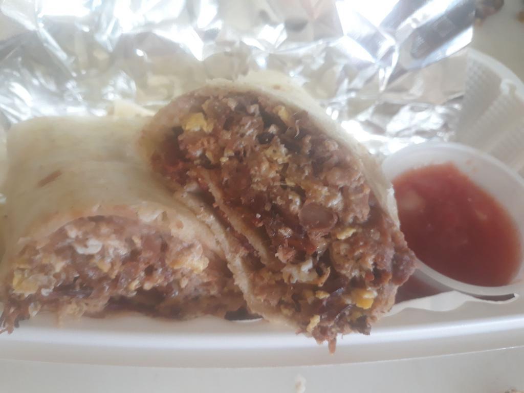 Burrito  Explosion · Fried burrito filled with chopped brisket, bbq sauce, pepper jack cheese and grilled onions. Accompanied by our special sauce for dipping.