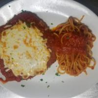 Chicken Parmigianino with Spaghetti · Breaded free-range chicken breast and melted fresh mozzarella cheese with homemade tomato sa...