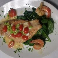 Dentice Mediterriano · Fillet of red snapper with baby shrimp, scallions and fresh parsley in a white wine lemon sa...