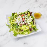 Greek Salad · Mixed greens, tomato, cucumber, red onions, black olives, feta cheese and Greek dressing.