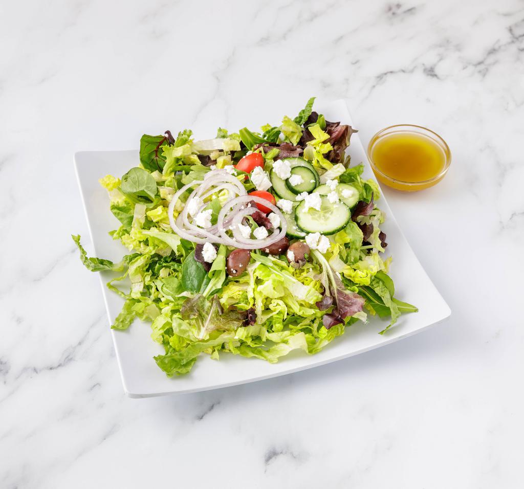 Greek Salad · Mixed greens, tomato, cucumber, red onions, black olives, feta cheese and Greek dressing.