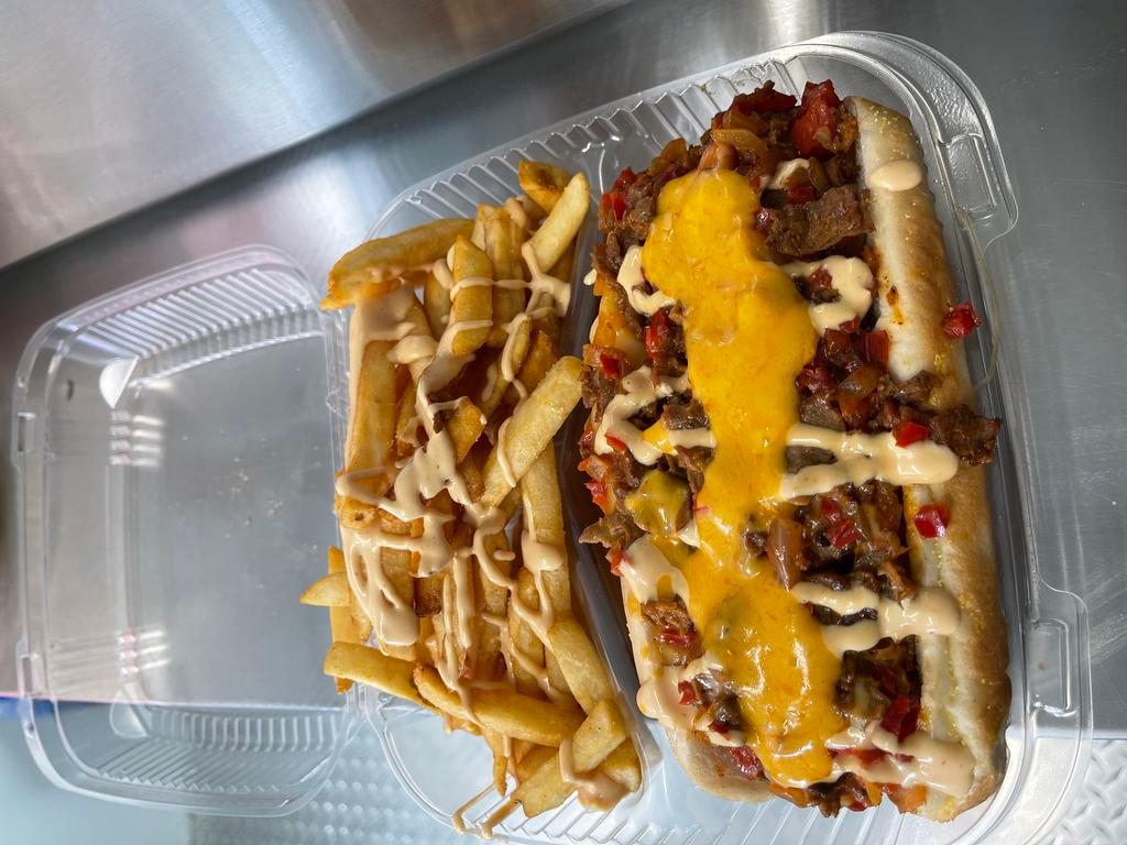 Philly Cheese Dog · Philly steak, bell pepper, onions, and cheese. Fries included.