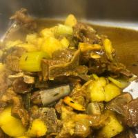Med.Curry Goat · Spiced natural flavor. Hot sauce if needed on the side