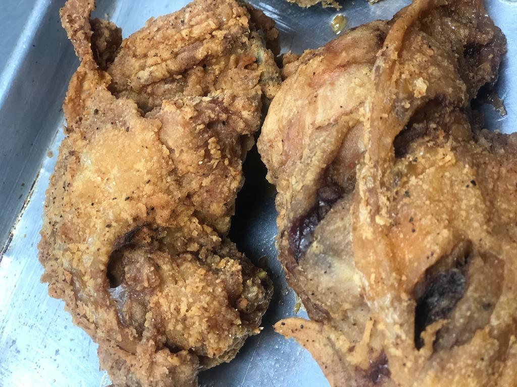 Sm. Fried Chicken  · Fried dark meat golden brown 
Hot or sweet sauce if needed