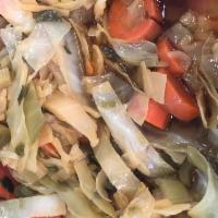 Steam cabbage  · Mix with carrots celery cabbage and seasoning to flavor 