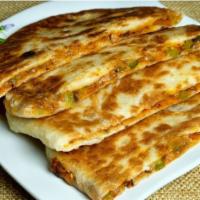 Aloo Paratha · Fried unleavened bread.