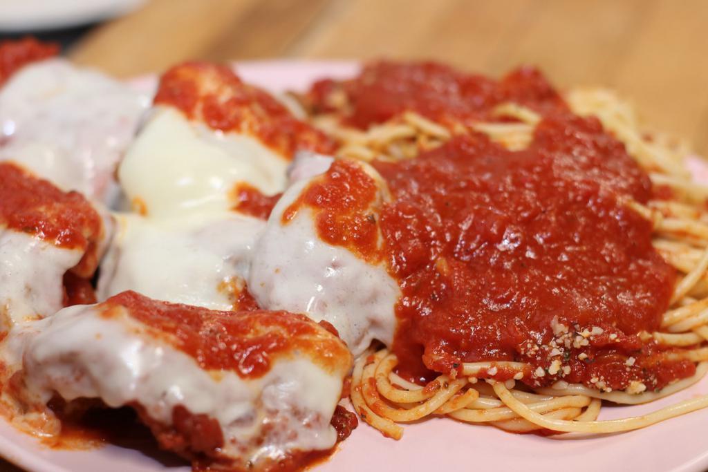 Chicken Parmigiana · Served with soup or salad. Your choice of ziti, linguini or spaghetti.