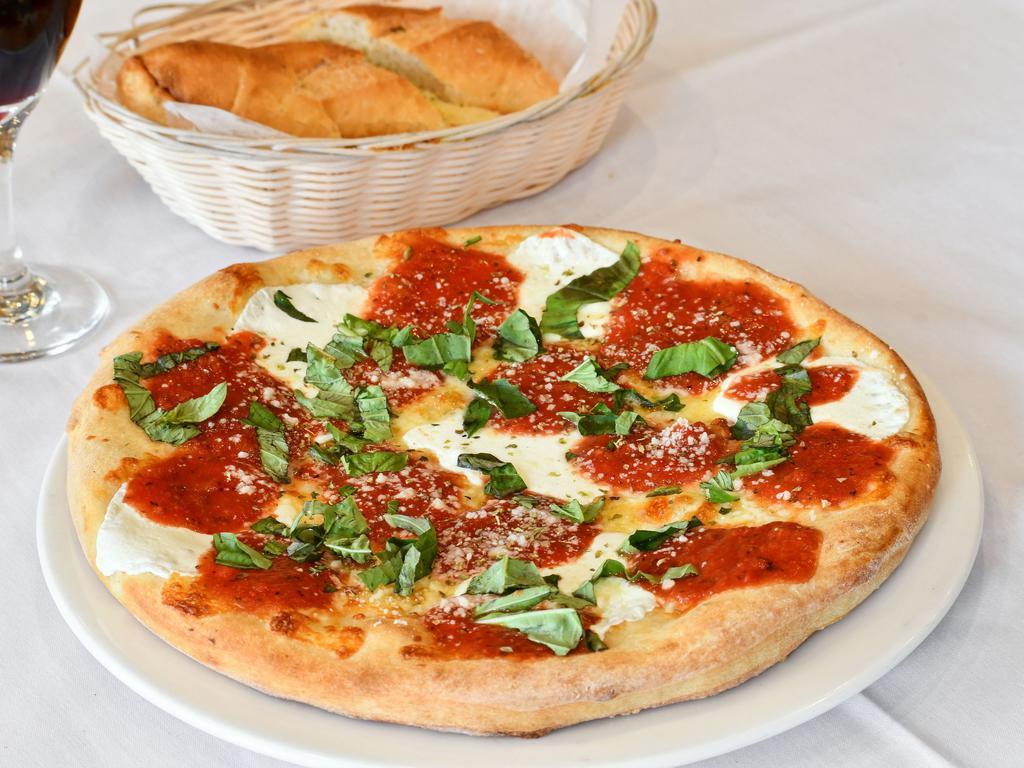 Margherita Single Serving Pizza · Tomato sauce, mozzarella cheese and basil.