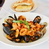 Black Linguini di Mare · Mix seafood, shrimp, scallops, mussels, clams, calamari and light Marinara Sauce