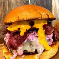 Pastrami Panda Burger Combo · Ground beef, Grilled Pastrami, Melted Swiss Cheese, Coleslaw & Russian dressing. Served with...