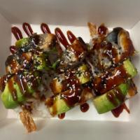 Dragon Roll · Crab salad, shrimp, eel, avocado on top, eel sauce and masago.