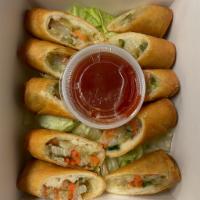 Spring Rolls · Side: sweet chili sauce 