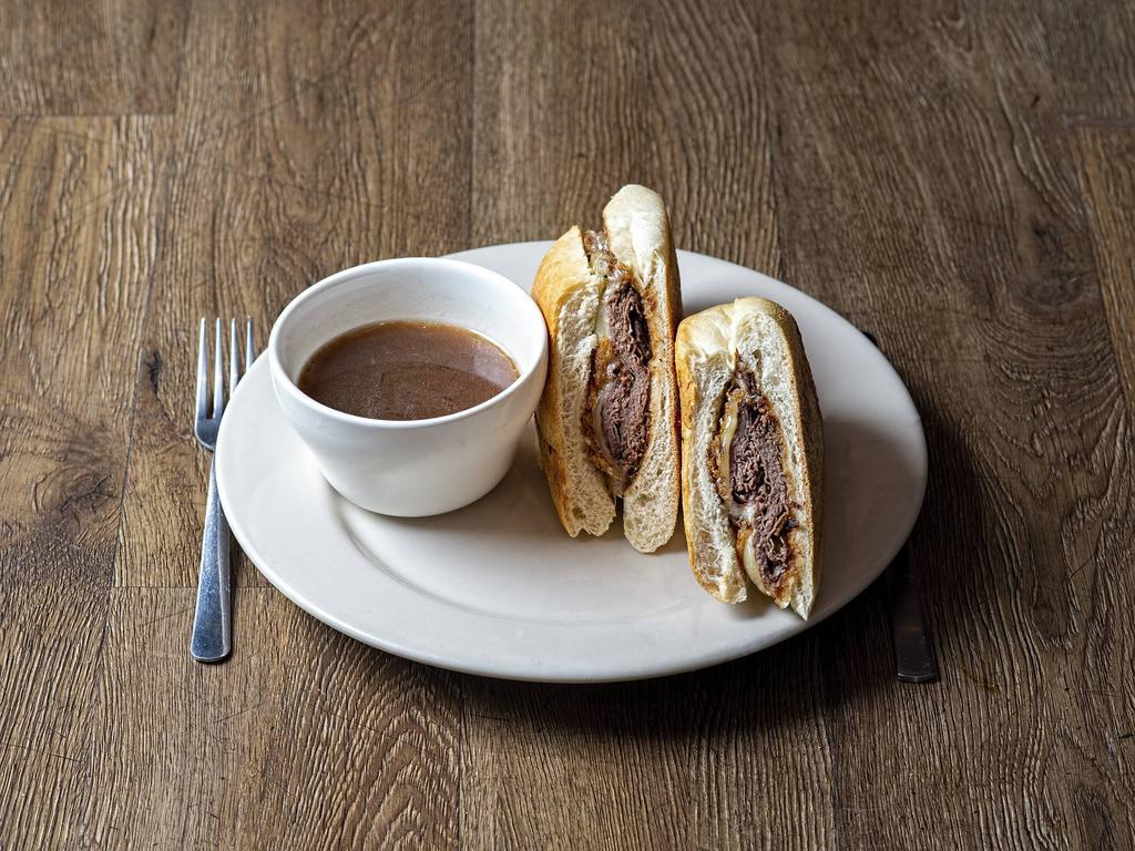 Charley's Signature French Dip Sandwich · Roast beef with provolone cheese, fried onions, on garlic bread and au jus for dipping.