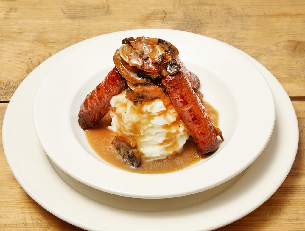 Bangers and Mash · Irish sausages with whipped potatoes, sauteed onions & gravy