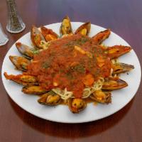Spaghetti with Mussels · Long thing pasta.