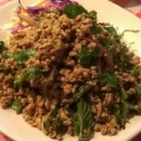 Larb Moo · Spicy minced pork salad, red onion, mint and liver. Spicy.