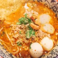 Tom Yum Noodle Soup · Minced pork, liver, fish ball, sprout and peanut. Spicy.