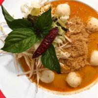 Ka Nom Jeen Nam Ya · Special curry chicken, fish ball on rice vermicelli noodle. Spicy.