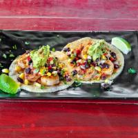 Shrimp Taco · Grilled Shrimp Topped with Roasted Corn Black Bean Salsa, Guacamole, Raw Onion and Cilantro
