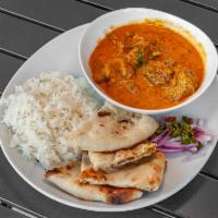 Butter Curry · Butter and cream in curry based sauce. With basmati rice and freshly made tandoori naan.