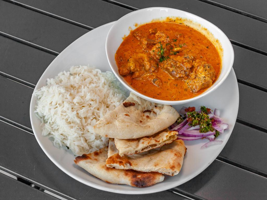 Butter Curry · Butter and cream in curry based sauce. With basmati rice and freshly made tandoori naan.