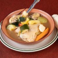 Caldo de Pollo · Delicious Authentic Chicken soup with chayote, squash, carrots and cabbage, served with rice...