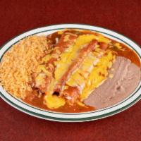Enchiladas Combinadas · 1 beef, 1 chicken and 1 cheese enchilada topped with gravy ranchero sauce and cheese.
Alang ...