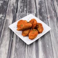 Jalapeno Poppers · Served with Ray’s signature ranchacha sauce.