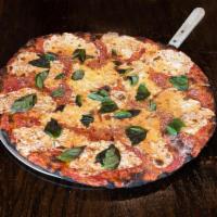 Margherita Pie · Fresh mozzarella, tomato sauce and fresh basil.